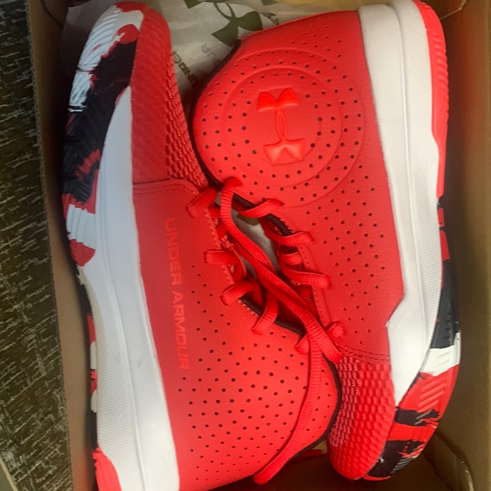 Red UA basketball shoes